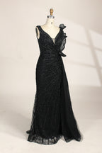 photograph of a mannequin wearing a stunning black evening gown, full-length, sleeveless, deep V-neck, intricate beadwork, flowing chiffon skirt, elegant, sophisticated, fashion, haute couture, runway model, high fashion, elegant design, detailed textures, luxurious, black and white, fashion photography, studio setting, plain background, soft lighting, shadow play, chic, elegant, classy, high-end fashion, glamour, haute couture fashion, evening wear.MC124-03