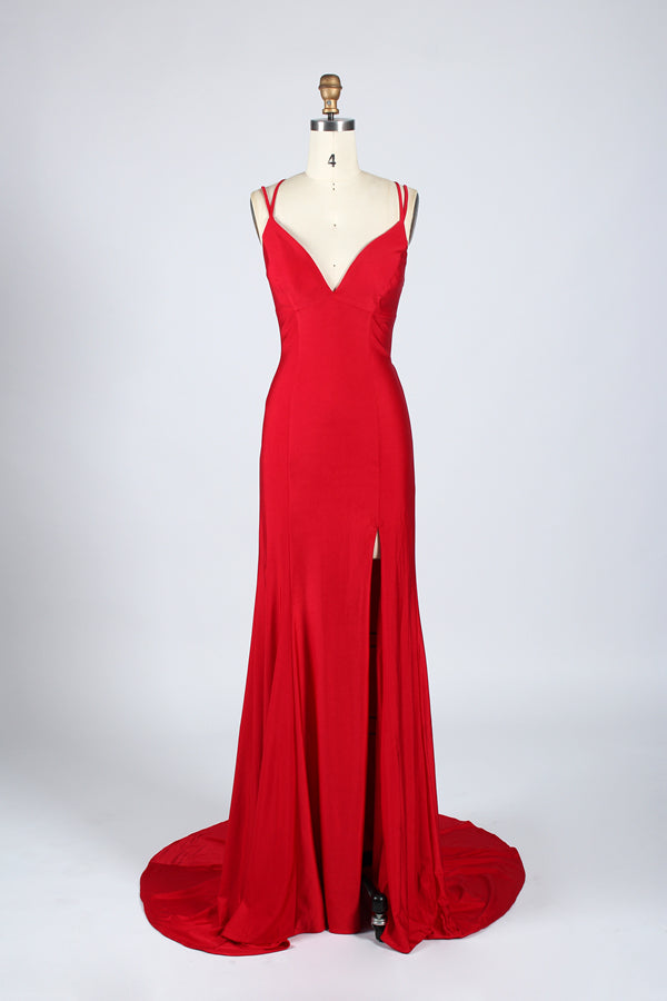 Displayed on a mannequin is a black evening gown. It features spaghetti straps, a deep V - neck, and a high slit with crystal detailing, creating a sleek and glamorous look for formal events.7