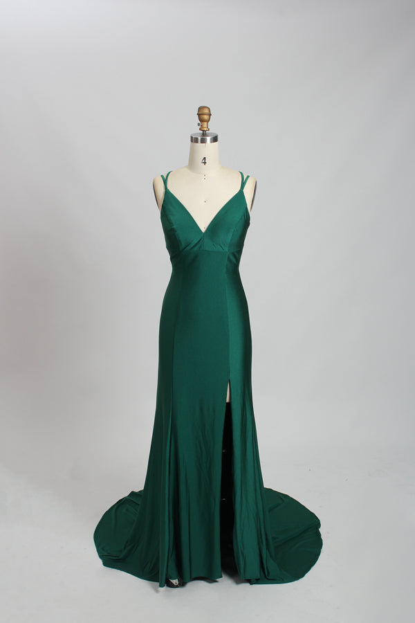Displayed on a mannequin is a black evening gown. It features spaghetti straps, a deep V - neck, and a high slit with crystal detailing, creating a sleek and glamorous look for formal events.9
