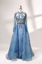 Presented on a mannequin is a blue - toned evening gown. It has a high neckline, long sheer sleeves, and intricate floral embroidery. The elegant design gives off a luxurious and sophisticated vibe, ideal for formal occasions.4